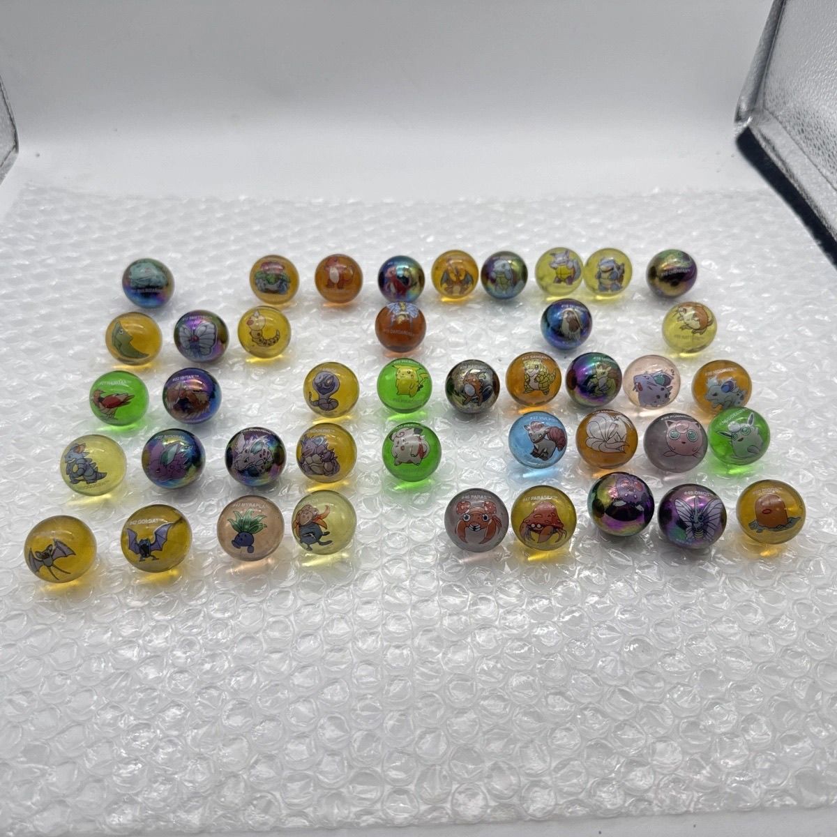 Mercancía Oficial de Pokémon,  - Vintage Collectible Marbles reseña y precio